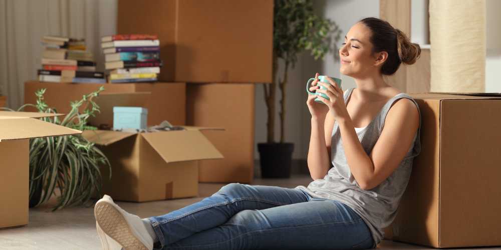 Tenant Find Plymouth - Lady Unpacking Boxes - Plymouth Homes Tenant Find Plymouth - Lady Unpacking Boxes - Plymouth Homes